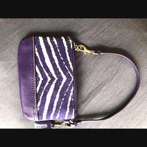 Like new Coach wristlet in purple zebra